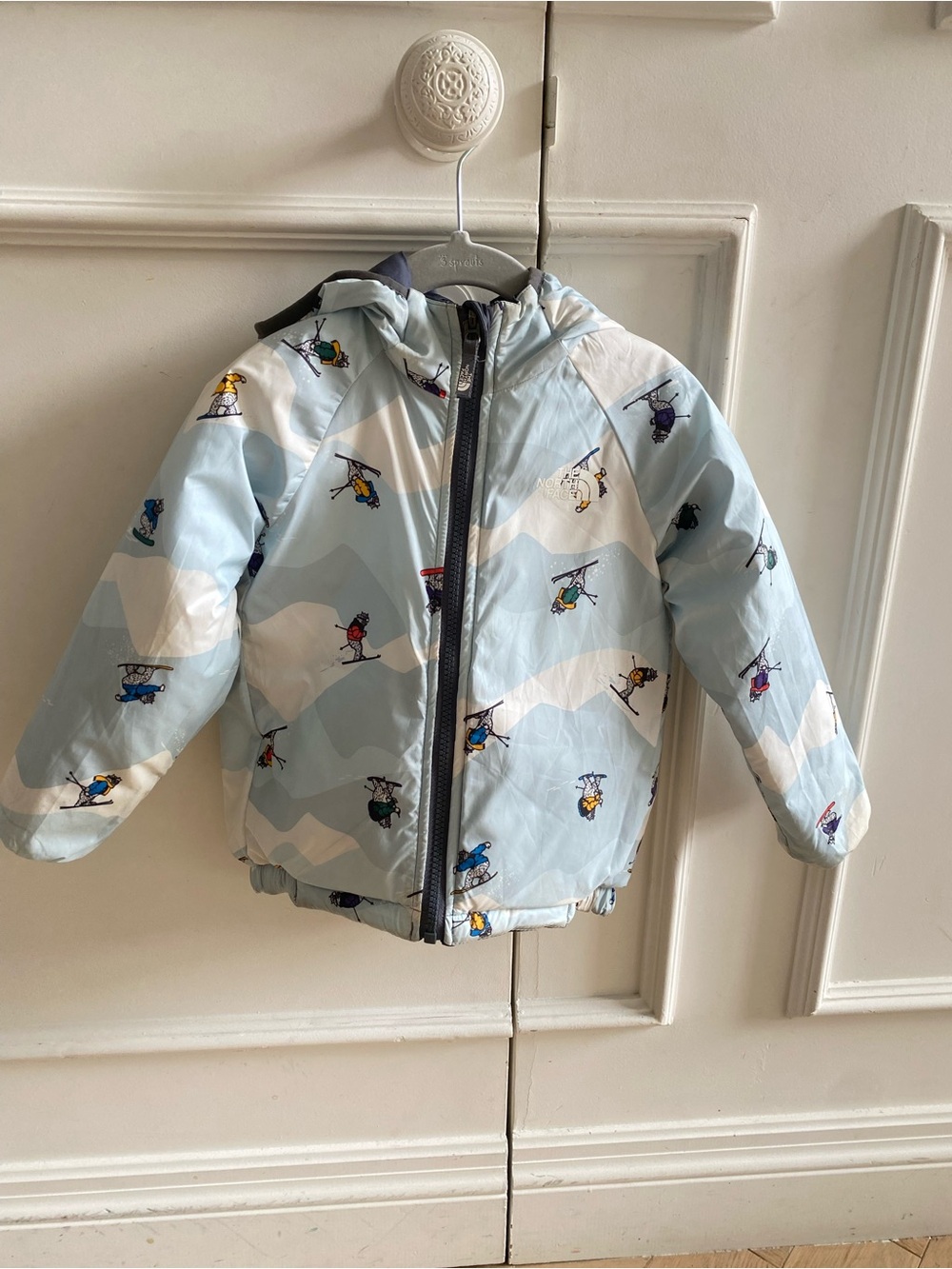 The North Face Light Blue reversible Ski-Print Hooded Puffer Jacket